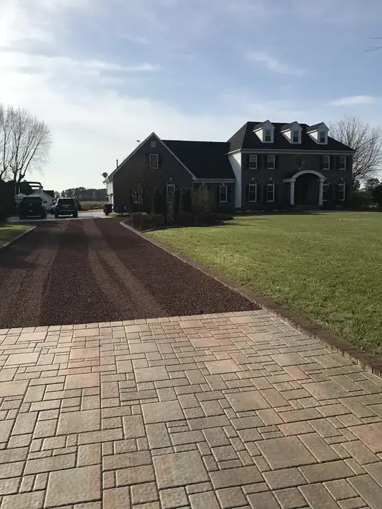 Tar And Chip Red Drive Meeting The Paver Walkway Federalsburg Md